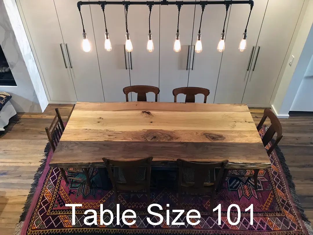 Mixed species dining table shown with 6 chairs.
